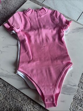 OQQ Ribbed Pink Zip-Front One-Piece Bodysuit